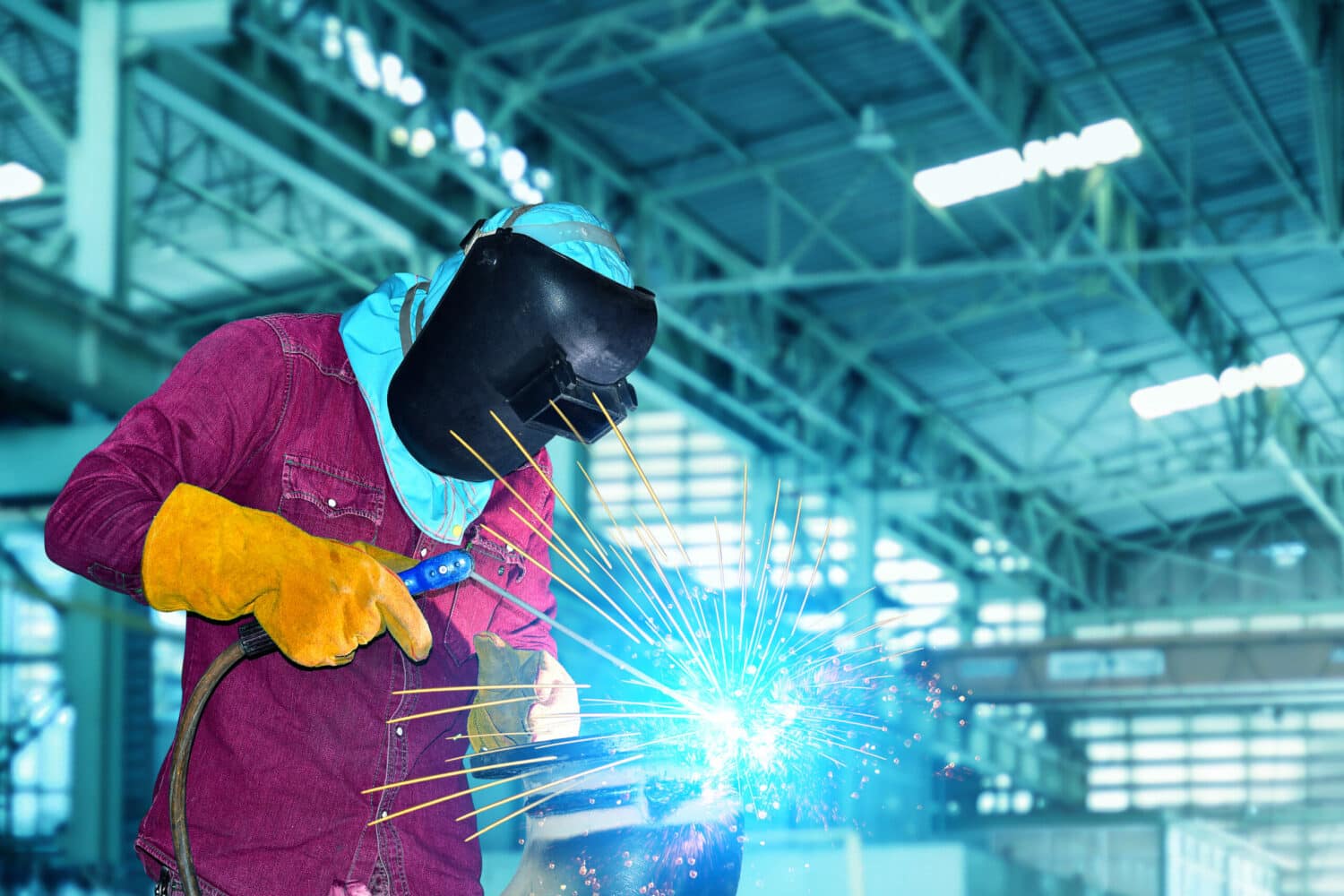 Welder,In,Industrial,Worker,With,Welding,Tool,With,Sparks,Light Welder,In,Industrial,Worker,With,Welding,Tool,With,Sparks,Light